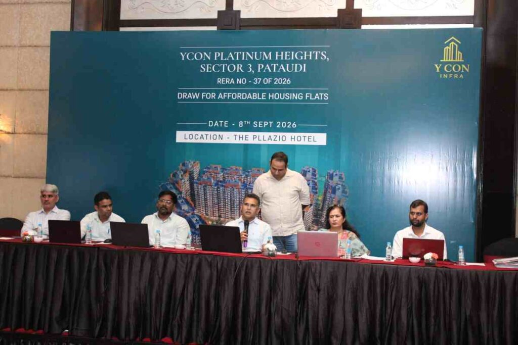 Government officials and YCON Infra representatives overseeing the allotment draw for YCON Platinum Heights homes in Gurugram